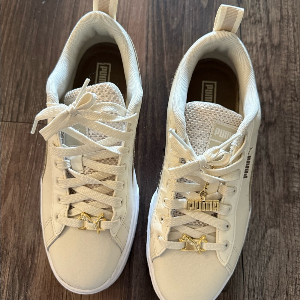 Puma Women's Ivory Sneakers with Gold Accents